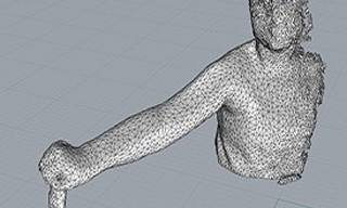 A 3D mesh figure created by taking photos of a child’s arm. A 3D model generated from photographs can be used to 3D print customize components for the NuroSleeve.